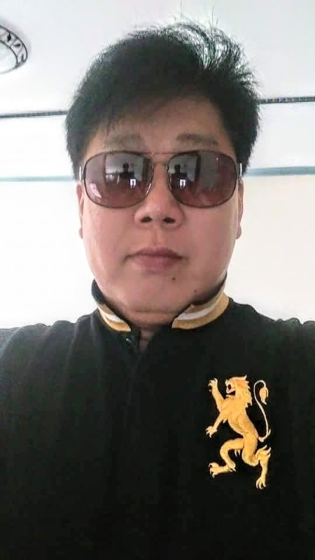 含笑半步癲的第一张照片--平和婚介网